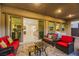 Patio with seating area and view into home at 349 Agnew St, Las Vegas, NV 89138