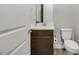 Clean powder room with dark vanity and modern toilet at 349 Agnew St, Las Vegas, NV 89138