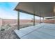 Wide-angle view of the covered patio and back yard at 3540 Valley Lily St, North Las Vegas, NV 89032