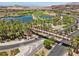 Aerial view of community, featuring a bridge and lake at 4 Via Centrale # 1, Henderson, NV 89011