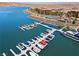 Picturesque lake community with modern boat docks and waterfront apartments at 4 Via Centrale # 1, Henderson, NV 89011