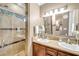 Elegant bathroom with double sinks and shower at 4 Via Centrale # 1, Henderson, NV 89011