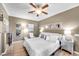 Main bedroom with a king bed and mirrored nightstands at 4 Via Centrale # 1, Henderson, NV 89011