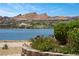 Stunning lakefront property with mountain views and lush landscaping at 4 Via Centrale # 1, Henderson, NV 89011