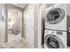 Stackable washer and dryer in a convenient hallway at 4 Via Centrale # 1, Henderson, NV 89011