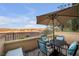 Patio furniture with umbrella overlooking scenic view at 4 Via Centrale # 1, Henderson, NV 89011