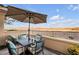 Patio furniture with umbrella overlooking scenic view at 4 Via Centrale # 1, Henderson, NV 89011