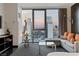 Modern living room featuring city views at 4381 W Flamingo Rd # 2310, Las Vegas, NV 89103