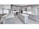 Modern kitchen with gray cabinets and quartz countertops at 4620 Clay Peak Dr, Las Vegas, NV 89129