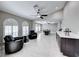 Living room with a wet bar and comfortable seating at 4620 Clay Peak Dr, Las Vegas, NV 89129