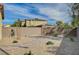 Landscaped backyard with a brick pathway at 4807 Enchanted View St, Las Vegas, NV 89149