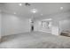 Spacious loft area with plush carpeting and open railing at 4807 Enchanted View St, Las Vegas, NV 89149