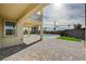 Covered patio adjacent to the pool and backyard at 4807 Enchanted View St, Las Vegas, NV 89149