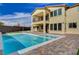 Stunning pool and spa surrounded by a patio at 4807 Enchanted View St, Las Vegas, NV 89149