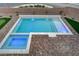 Stunning pool with spa and brick paver deck at 4807 Enchanted View St, Las Vegas, NV 89149