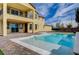 Luxury pool and spa with a spacious patio at 4807 Enchanted View St, Las Vegas, NV 89149