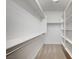 Large walk-in closet with shelves and hanging space at 4807 Enchanted View St, Las Vegas, NV 89149