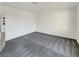 Bright living room featuring gray carpeting and an open floor plan at 4917 E Washington Ave, Las Vegas, NV 89110