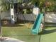 Large backyard playset with slide and swings at 503 Lariat Ln, Henderson, NV 89014