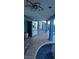 Relaxing hot tub with tiled patio and refrigerator at 5162 Woodruff Pl, Las Vegas, NV 89120