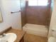 Clean bathroom with tile shower/tub combo and granite vanity at 5175 Orinda Ave, Las Vegas, NV 89120