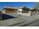 Ranch style home with a large yard and driveway at 5175 Orinda Ave, Las Vegas, NV 89120