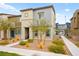 Two-story home with gray siding and landscaped front yard at 531 Thistleberry Ave, Henderson, NV 89044