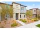 Two-story home with gray siding and landscaped front yard at 531 Thistleberry Ave, Henderson, NV 89044