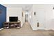 Spacious hallway with a TV and fireplace at 531 Thistleberry Ave, Henderson, NV 89044