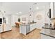 Modern kitchen with white cabinets, granite counters and stainless steel appliances at 531 Thistleberry Ave, Henderson, NV 89044