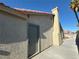 Backyard view showing access to a storage area at 5640 Judith Resnik Ct, Las Vegas, NV 89103