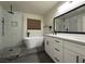 Elegant bathroom with soaking tub and double vanity at 5640 Judith Resnik Ct, Las Vegas, NV 89103