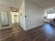 Bright hallway with hardwood floors and neutral walls at 5640 Judith Resnik Ct, Las Vegas, NV 89103