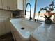 Modern kitchen sink with a sleek gooseneck faucet at 5640 Judith Resnik Ct, Las Vegas, NV 89103