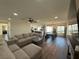 Open concept living area with hardwood floors and fireplace at 5640 Judith Resnik Ct, Las Vegas, NV 89103