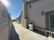 Side yard with concrete patio and privacy wall at 5640 Judith Resnik Ct, Las Vegas, NV 89103