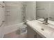 Bathroom with tub, toilet and modern vanity at 5932 Quintillion Ave, Las Vegas, NV 89122