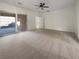 Bedroom with carpet and sliding glass door to patio at 5932 Quintillion Ave, Las Vegas, NV 89122