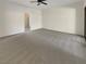 Spacious main bedroom with plush carpeting and access to bathroom at 5932 Quintillion Ave, Las Vegas, NV 89122