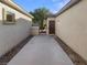 Side yard access with gated entry at 5932 Quintillion Ave, Las Vegas, NV 89122