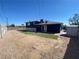 Large backyard with gravel and a view of the house at 6124 Jones Cir, Las Vegas, NV 89107