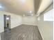 Bright and airy basement rec room with new flooring at 6124 Jones Cir, Las Vegas, NV 89107