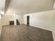 Spacious basement Gathering room with new wood-look flooring at 6124 Jones Cir, Las Vegas, NV 89107