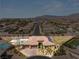 Aerial view of single-Gathering home with pool and solar panels at 6188 Rockville Creek Ct, Las Vegas, NV 89149