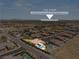 Aerial view showing home, pool, and distant Las Vegas Strip at 6188 Rockville Creek Ct, Las Vegas, NV 89149