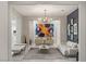 Elegant living room with chandelier and modern art at 6188 Rockville Creek Ct, Las Vegas, NV 89149