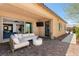 Covered patio with seating area, perfect for outdoor entertaining at 6188 Rockville Creek Ct, Las Vegas, NV 89149