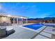 Luxury pool and spa with outdoor kitchen and pergola at 6188 Rockville Creek Ct, Las Vegas, NV 89149