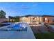 Pool and spa with pergola, outdoor kitchen and lounge chairs at 6188 Rockville Creek Ct, Las Vegas, NV 89149