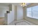 Dining area features neutral decor, stylish tile flooring, and a bright window view at 698 S Racetrack Rd # 711, Henderson, NV 89015